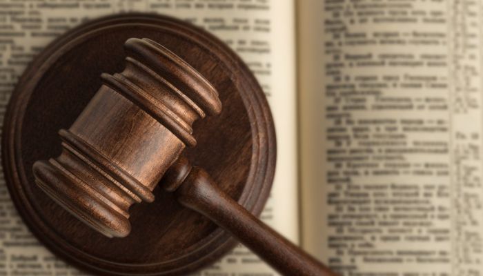 gavel on top of open book