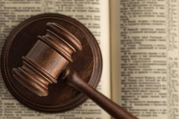 gavel on top of open book