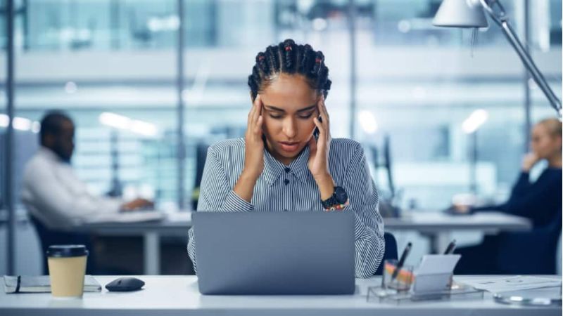 Woman at work headache